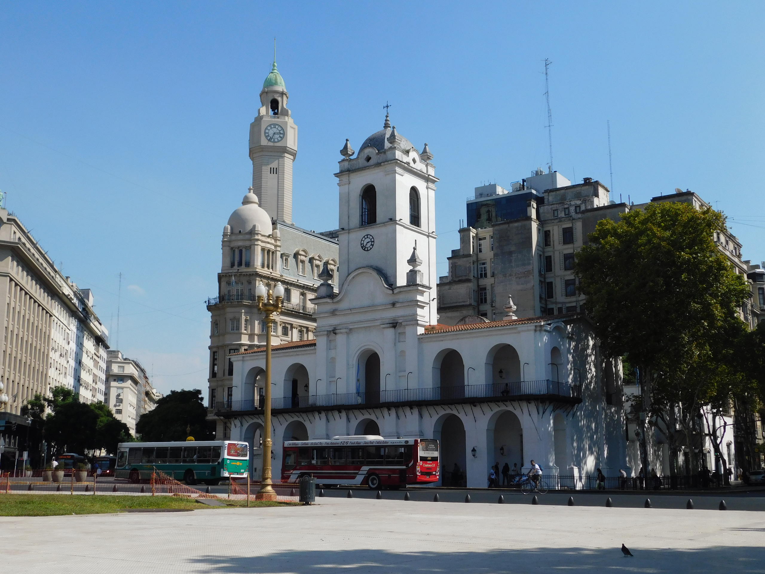 a large clock tower towering over a city