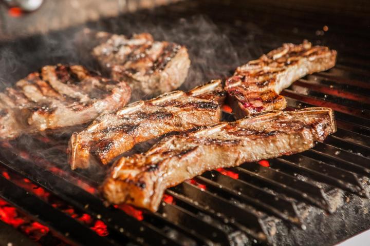 a close up of food on a grill