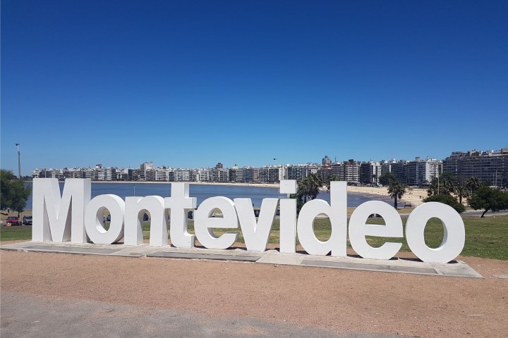 a sign in front of a building